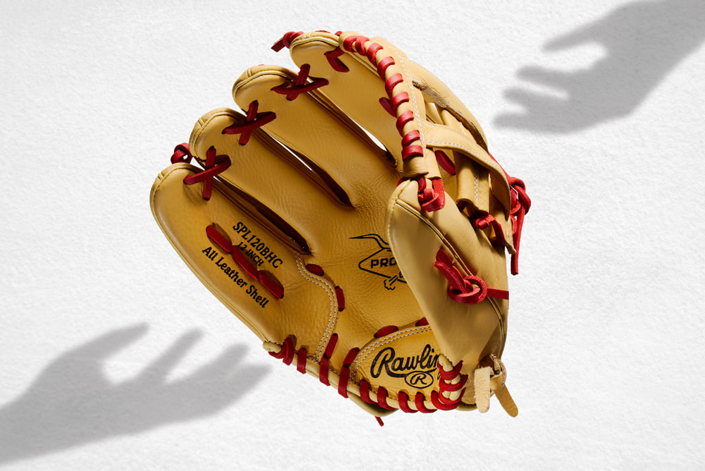 Rawlings Bryce Harper Youth Baseball glove against a white background, shot by professional product photographer Mike Taylor, in Peterborough Ontario.