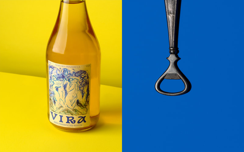 A pair of images with a bottle of wine on the left against a yellow background, the image on the right is of an inverted bottle opener laying on a dark blue paper.